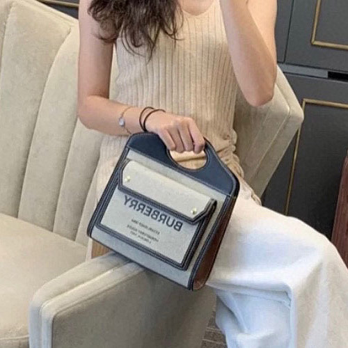 버버리 캔버스 레더 투톤 미니 포켓백 80317461